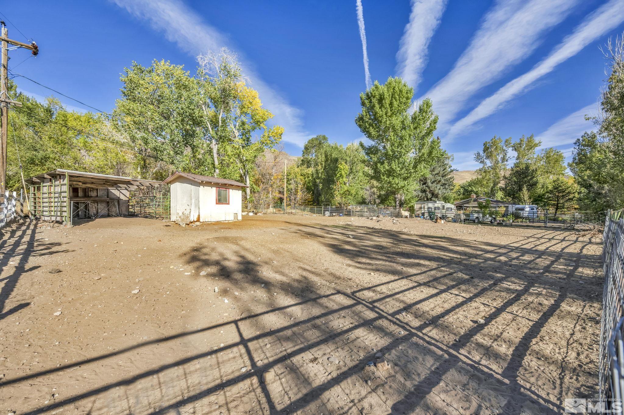 55 Surrey Drive Reno, NV 89521 - Photo 31 of 40 a view of a backyard of the house