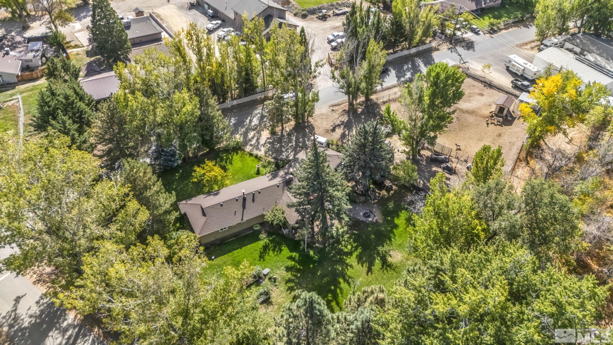 55 Surrey Drive Reno, NV 89521 - Photo 32 of 40 an aerial view of a house with a yard