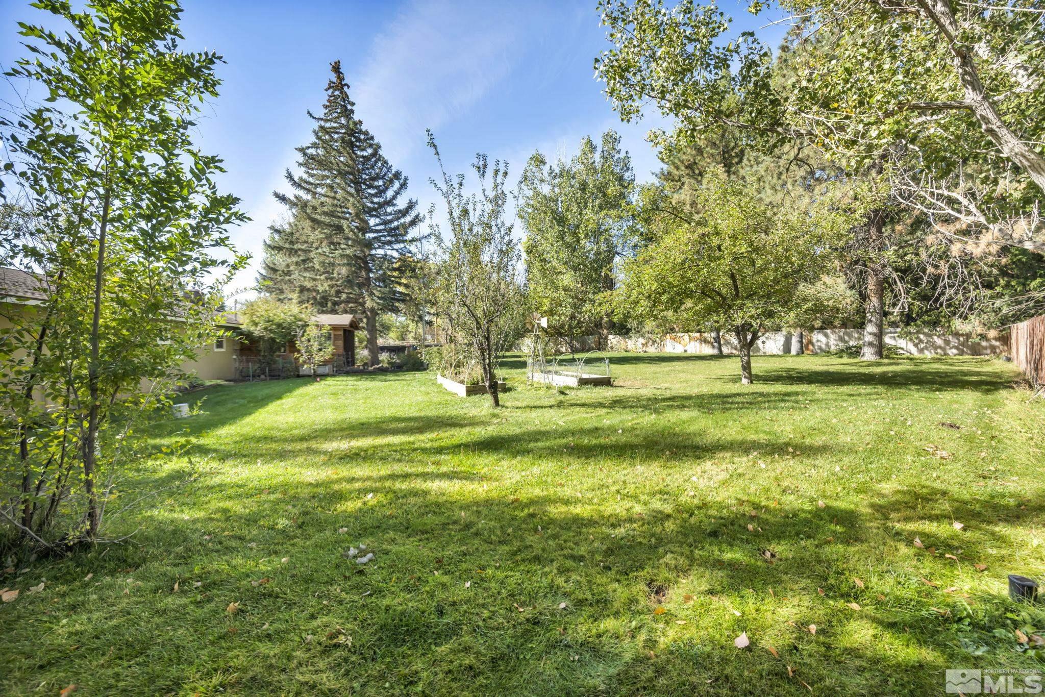 55 Surrey Drive Reno, NV 89521 - Photo 37 of 40 a view of a park with large trees