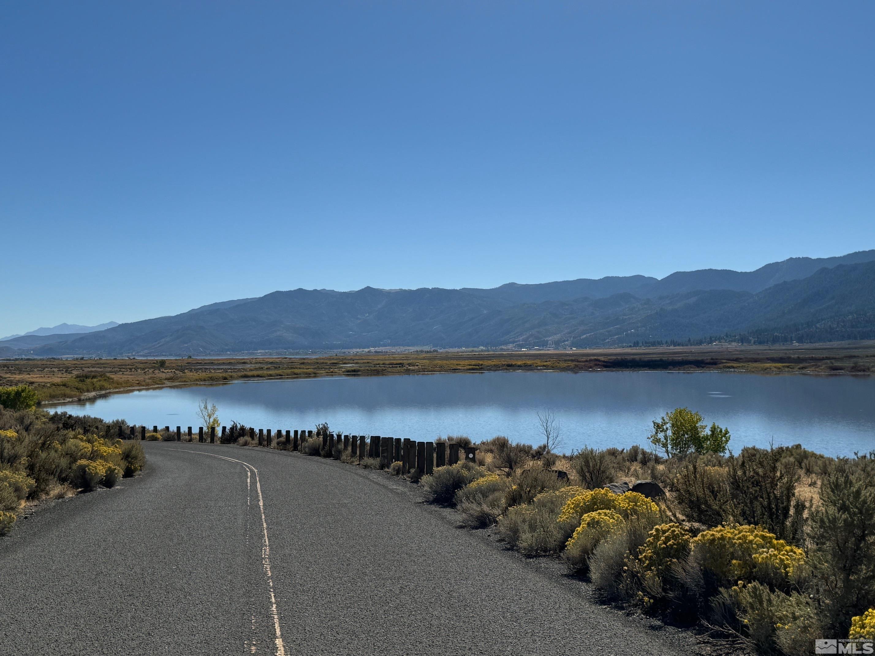 55 Surrey Drive Reno, NV 89521 - Photo 40 of 40 a view of a lake from a balcony