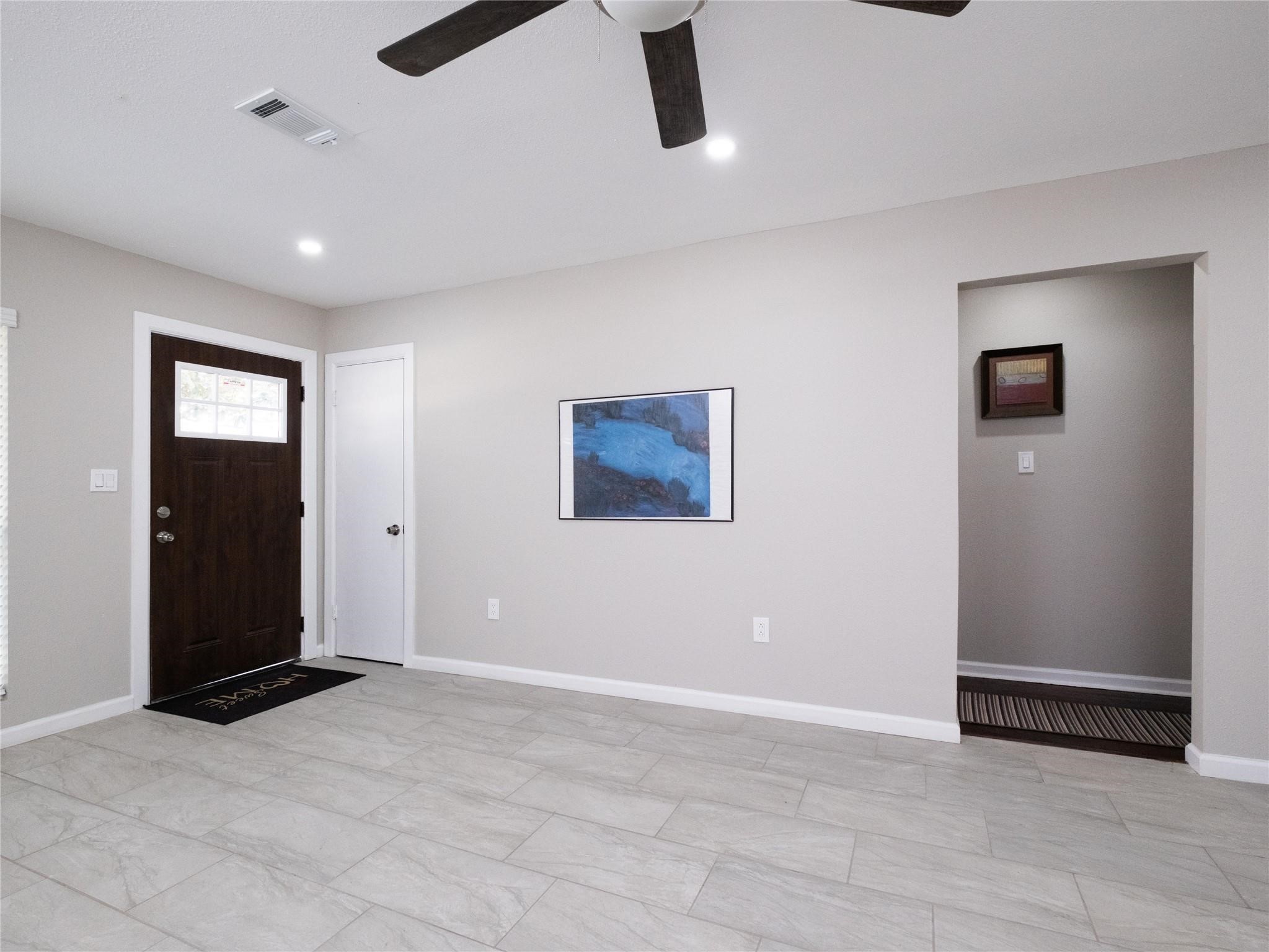 3215 Soway Street Houston, TX 77080 - Photo 16 of 29 an empty room with closet and windows