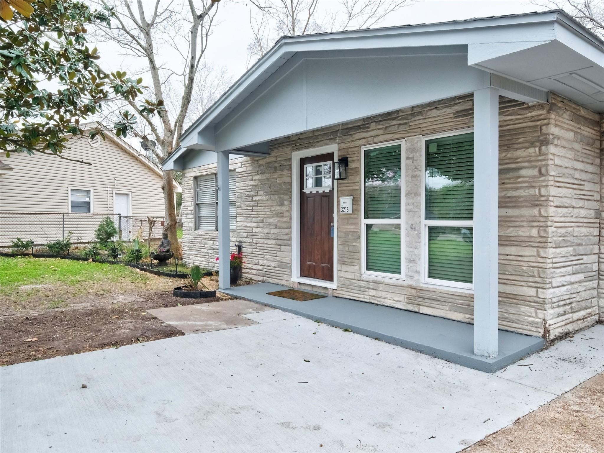 3215 Soway Street Houston, TX 77080 - Photo 20 of 29 a front view of a house with a yard