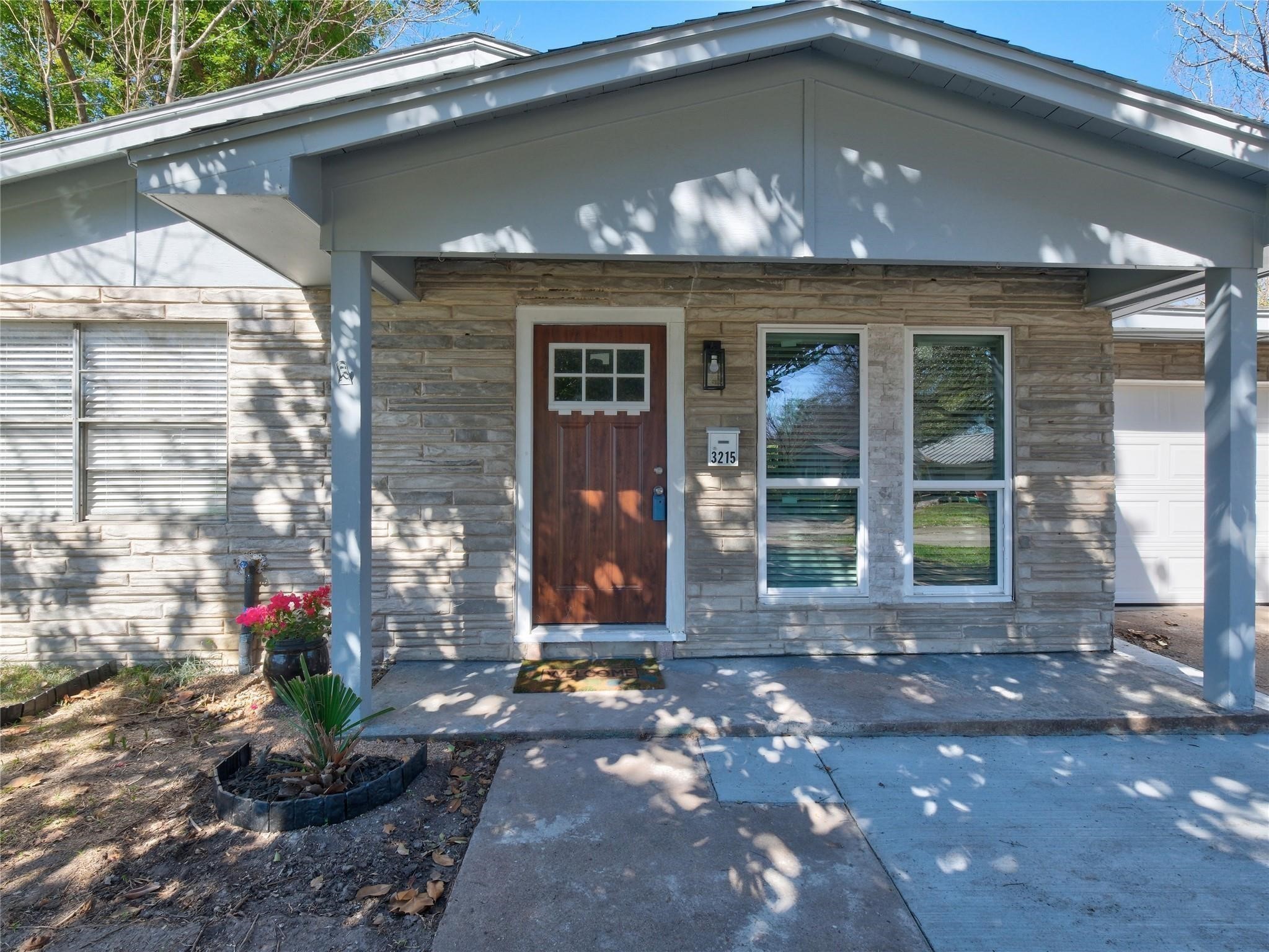 3215 Soway Street Houston, TX 77080 - Photo 22 of 29 a front view of a house with a porch