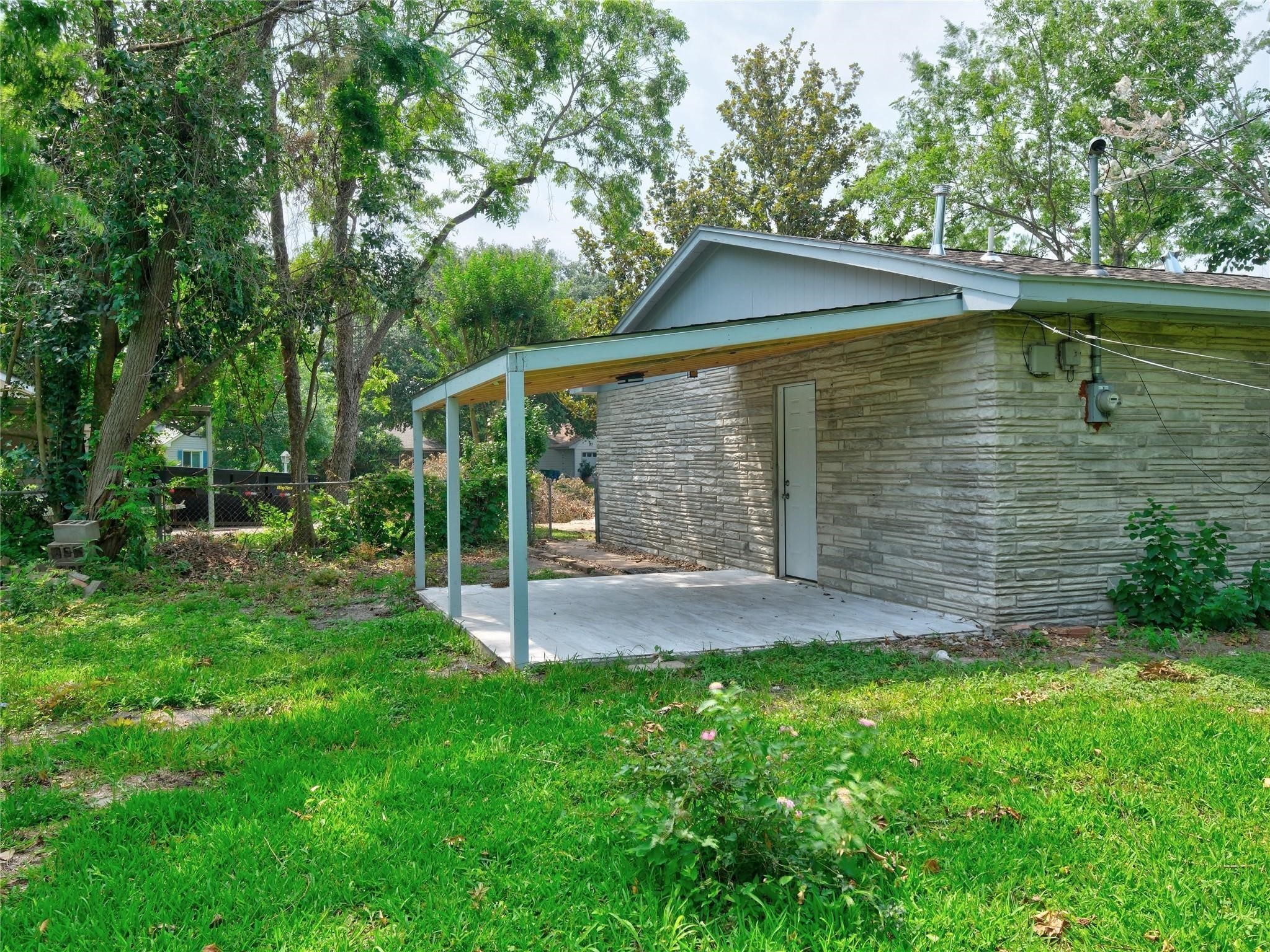 3215 Soway Street Houston, TX 77080 - Photo 26 of 29 a view of a small house with a yard