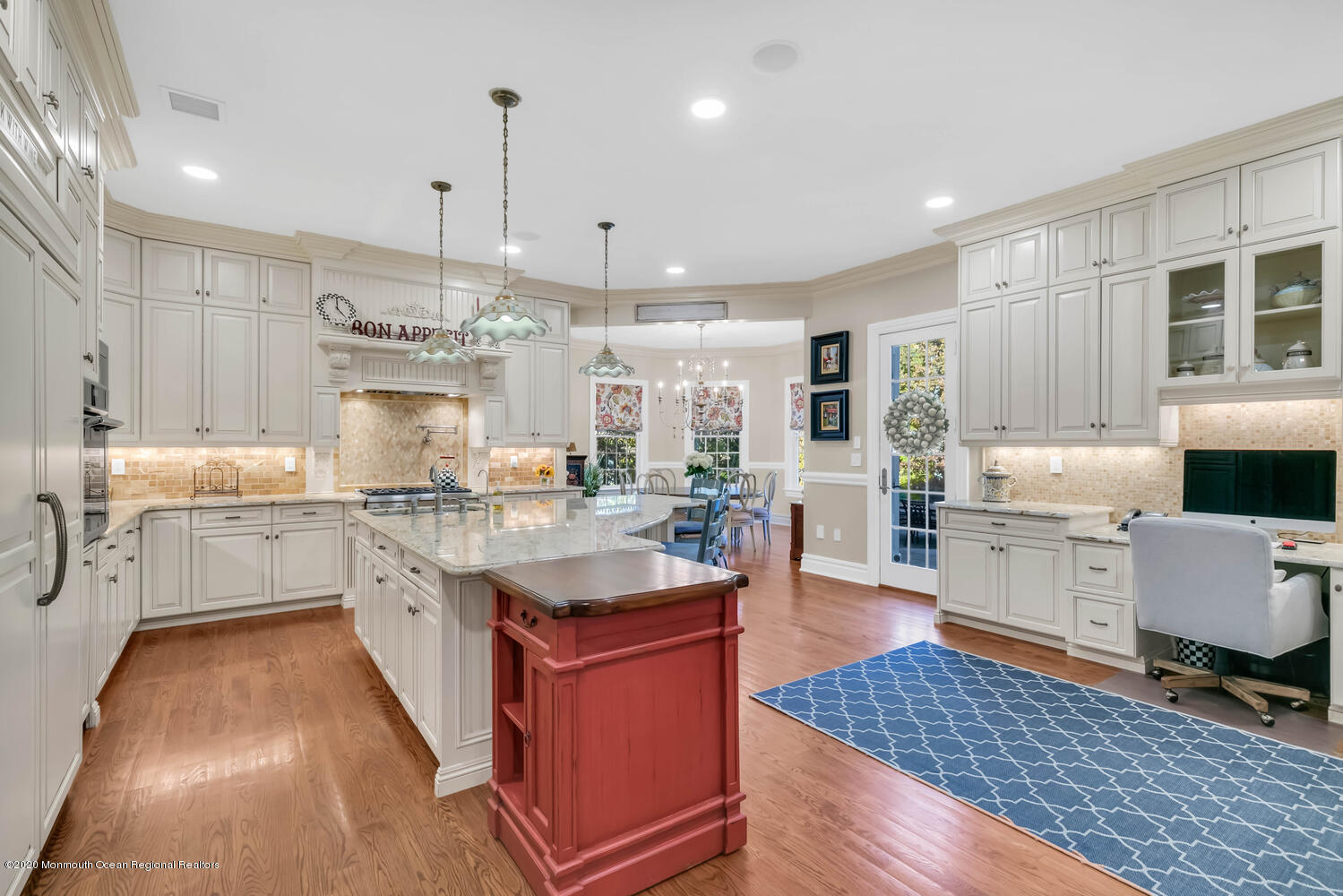 280 Portland Road Atlantic Highlands, NJ 07716 - Photo 16 of 74 a large kitchen with stainless steel appliances kitchen island granite countertop a large stove a sink dishwasher and white cabinets with wooden floor