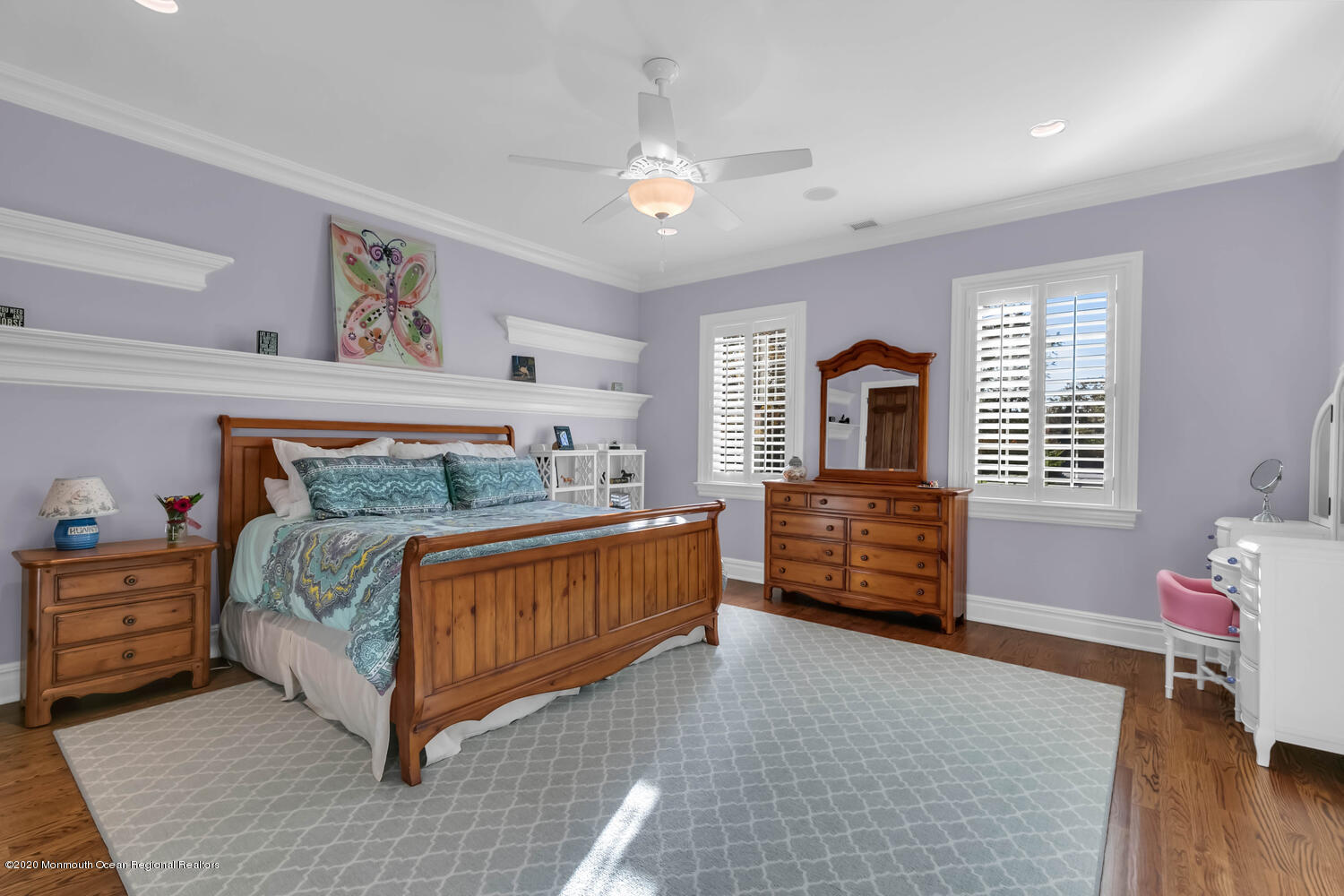 280 Portland Road Atlantic Highlands, NJ 07716 - Photo 28 of 74 a bedroom with a bed and a chandelier