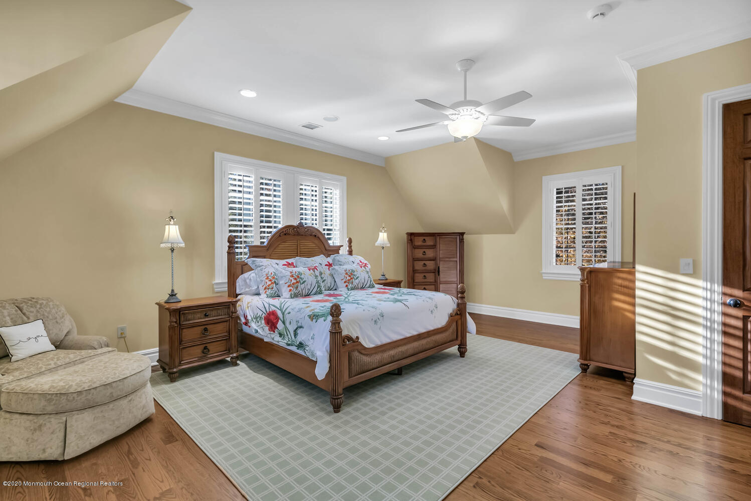 280 Portland Road Atlantic Highlands, NJ 07716 - Photo 32 of 74 a bedroom with a large bed and a chandelier