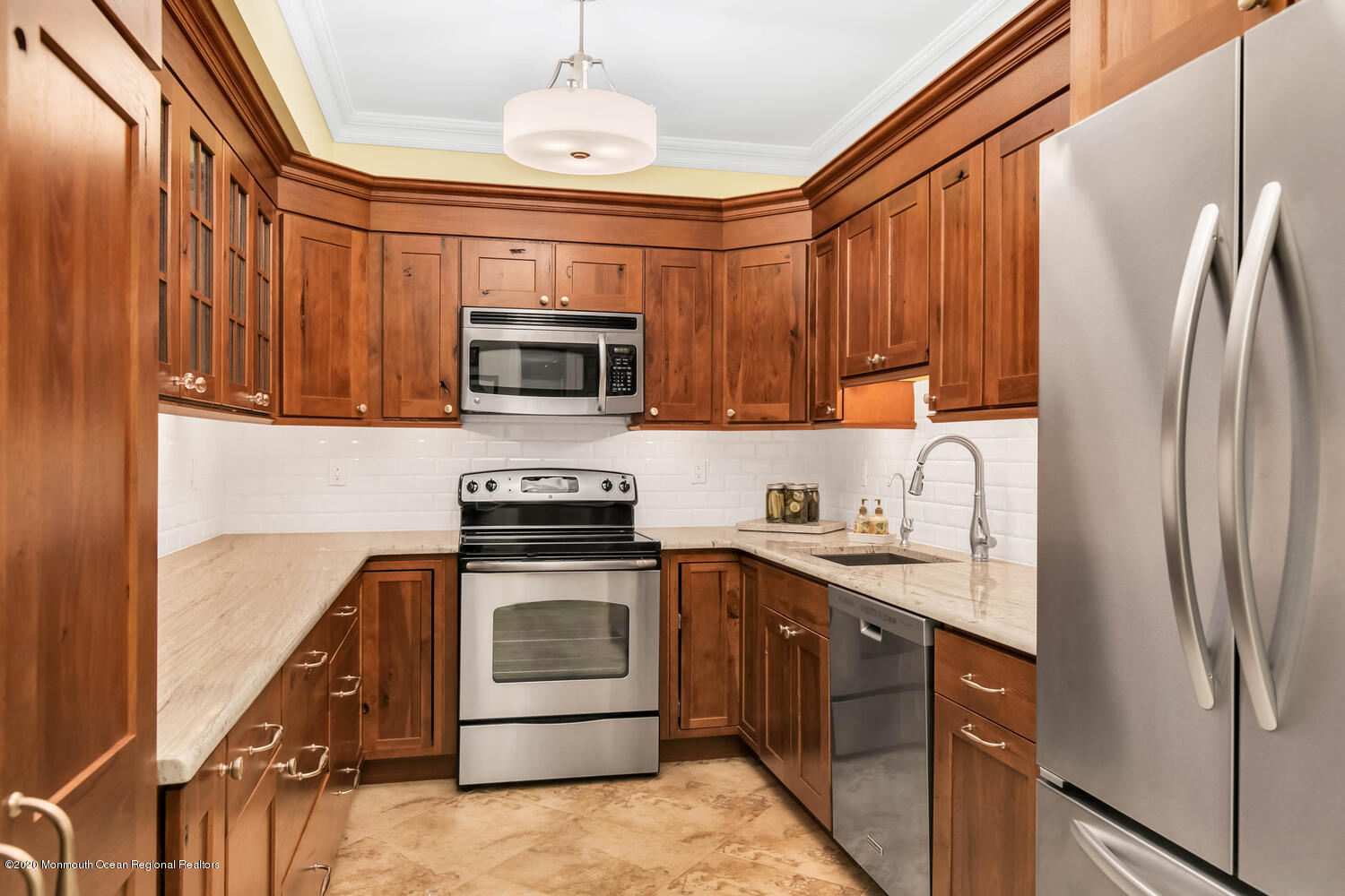 280 Portland Road Atlantic Highlands, NJ 07716 - Photo 47 of 74 a kitchen with stainless steel appliances granite countertop a stove top oven a sink dishwasher a refrigerator and a microwave