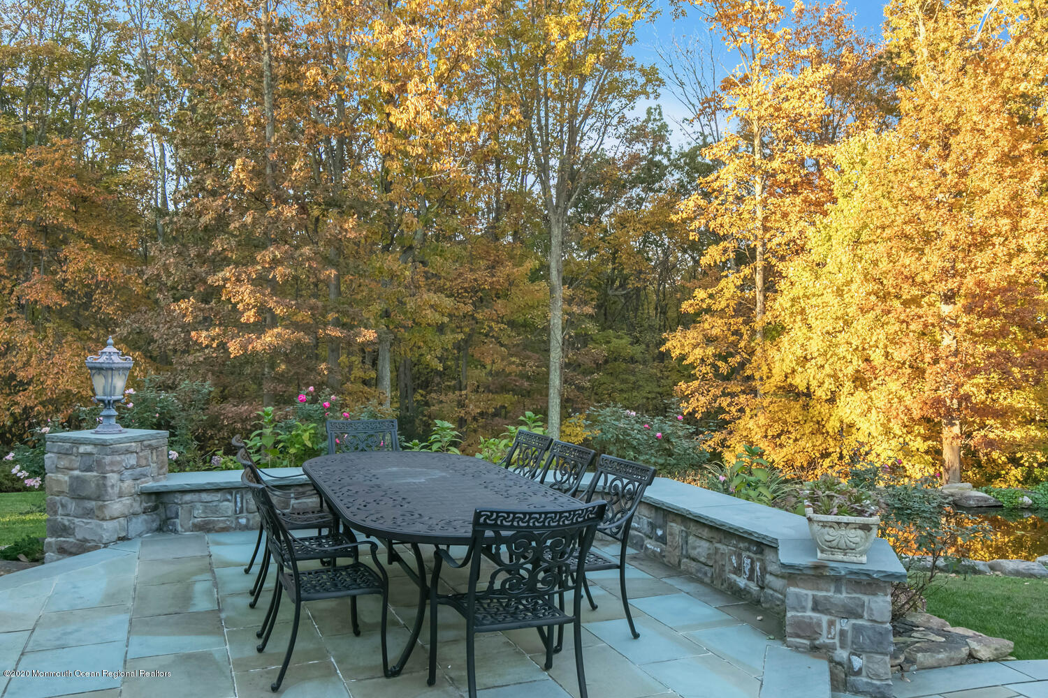 280 Portland Road Atlantic Highlands, NJ 07716 - Photo 63 of 74 a view of a backyard with table and chairs