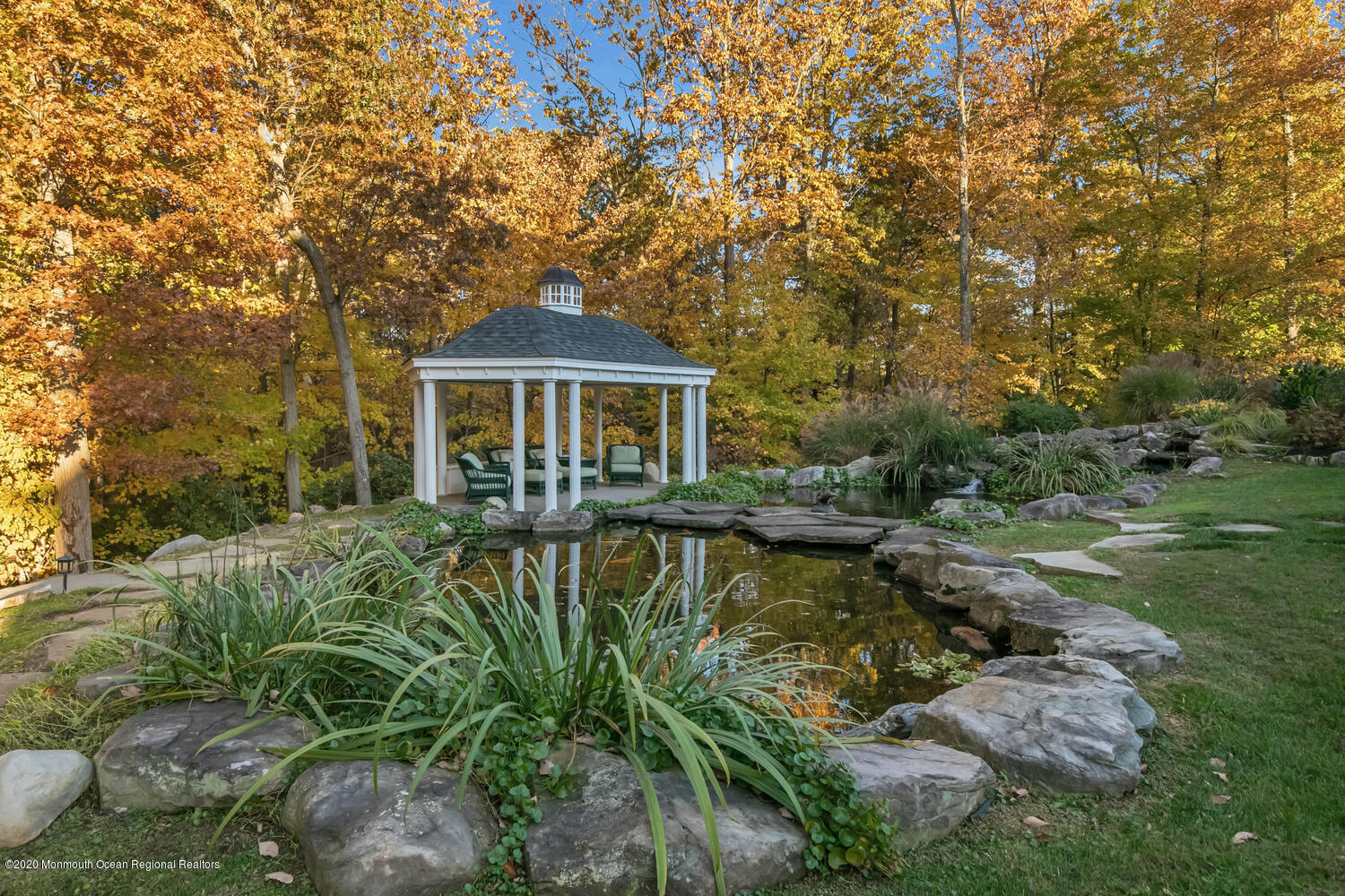 280 Portland Road Atlantic Highlands, NJ 07716 - Photo 66 of 74 a front view of a house with a yard table and chairs