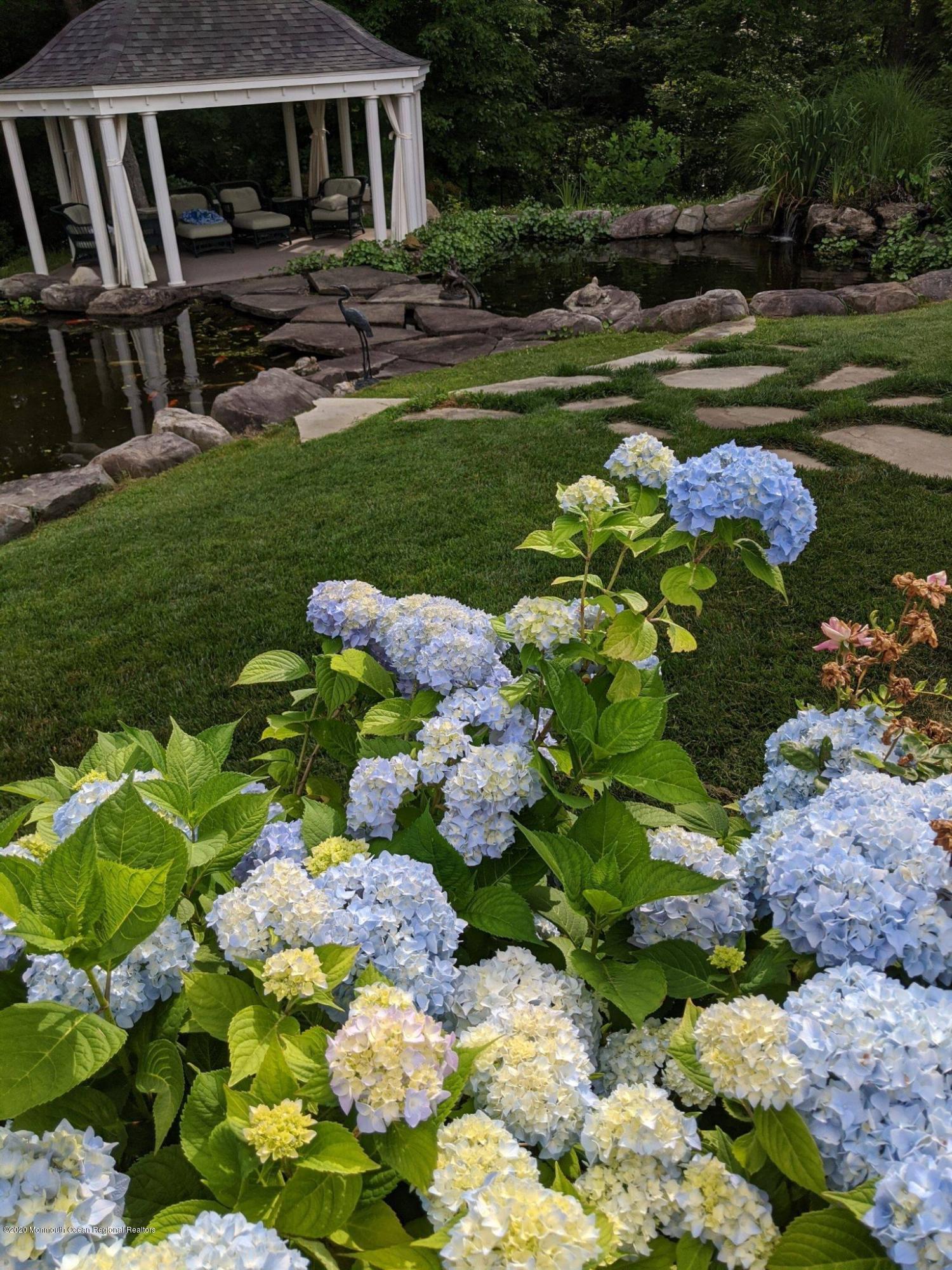 280 Portland Road Atlantic Highlands, NJ 07716 - Photo 71 of 74 a garden with lots of flowers and trees