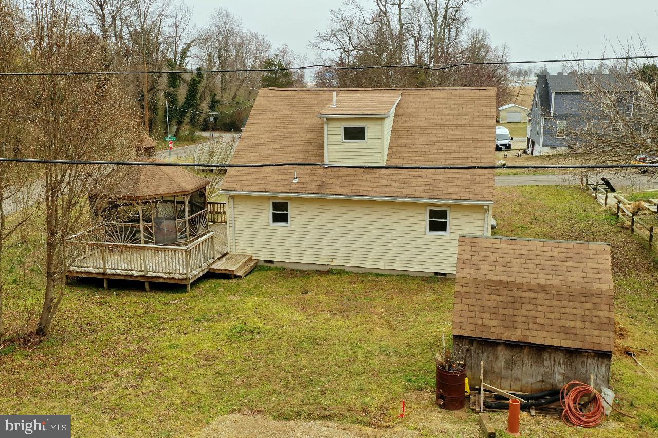3322 Burgess Road Chesapeake Beach, MD 20732 - Photo 22 of 45 Backyard with shed