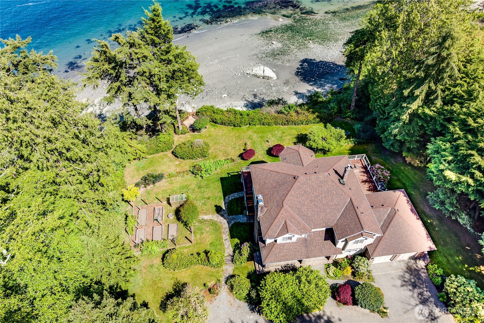 252 Jansen Road Nordland, WA 98358 - Photo 39 of 40 an aerial view of a house with a yard