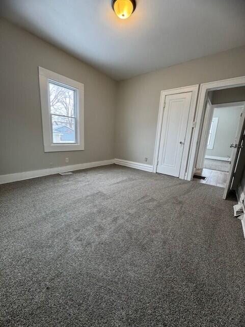 2715 164th Place Hammond, IN 46323 - Photo 4 of 12 a view of an empty room with a window