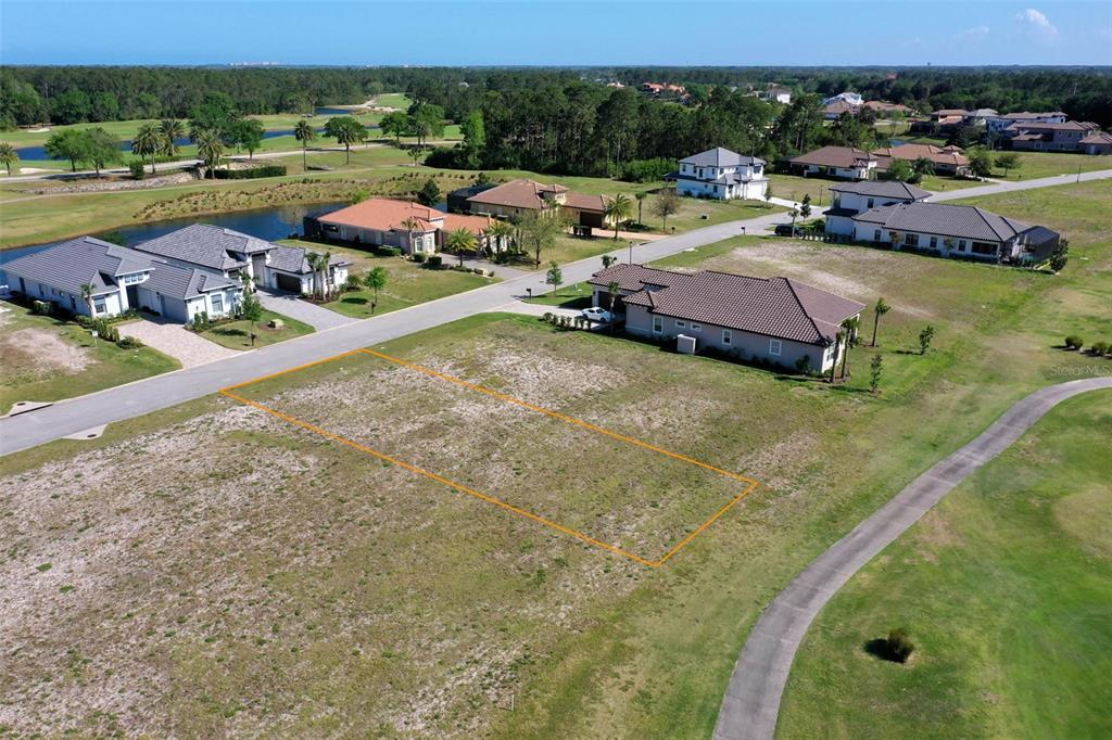 348 Hibiscus Way Palm Coast, FL 32137 - Photo 12 of 46 a view of swimming pool and lake view
