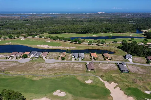 a view of a golf course with a garden