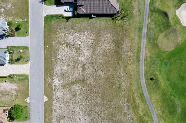 a view of a lake with a yard