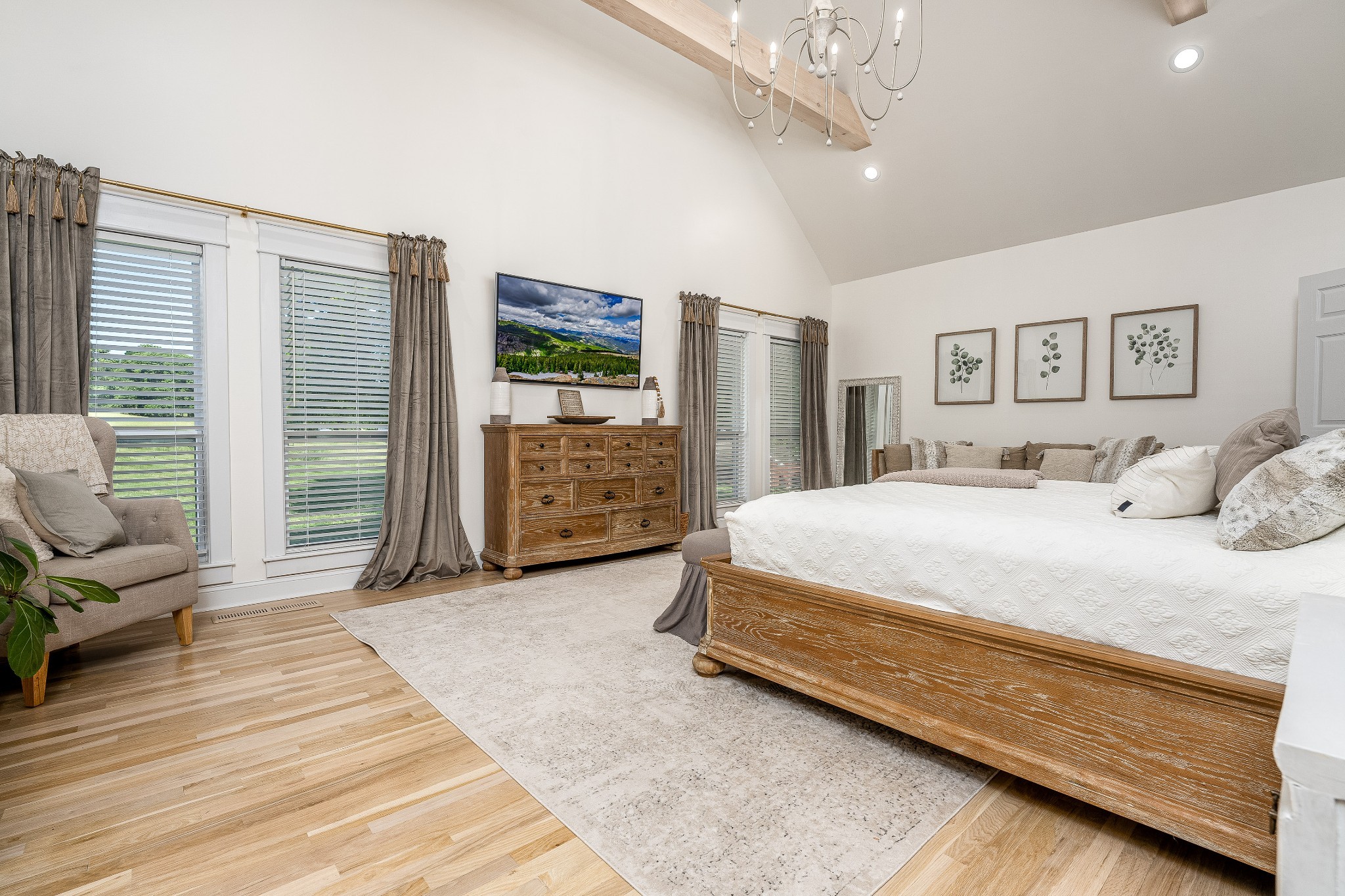 4901 Toll Dugger Road Culleoka, TN 38451 - Photo 22 of 68 a spacious bedroom with a bed a couch and large window