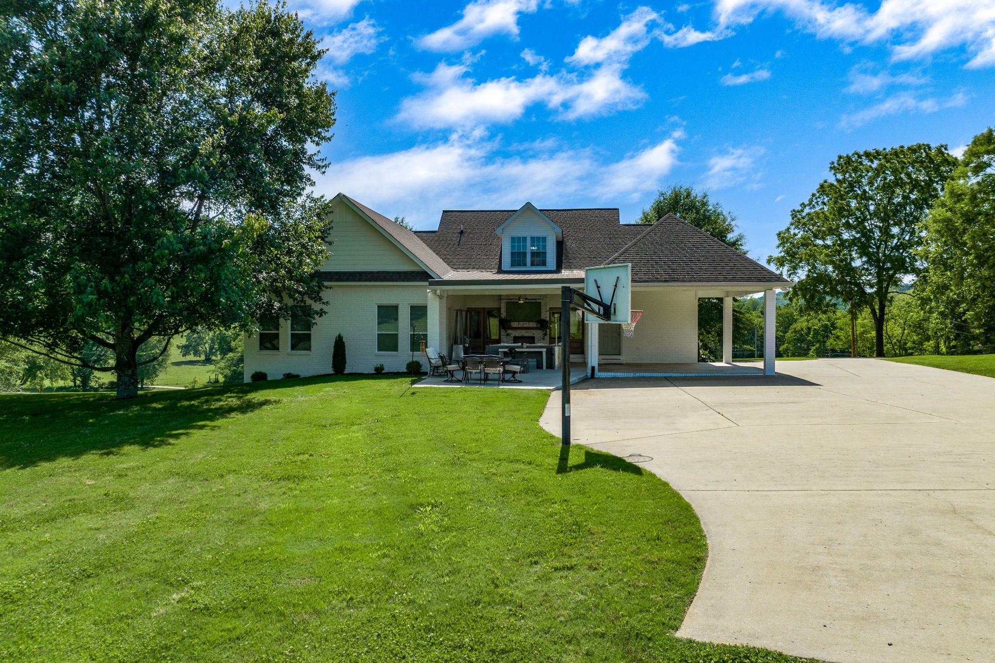 4901 Toll Dugger Road Culleoka, TN 38451 - Photo 6 of 68 a front view of a house with a garden