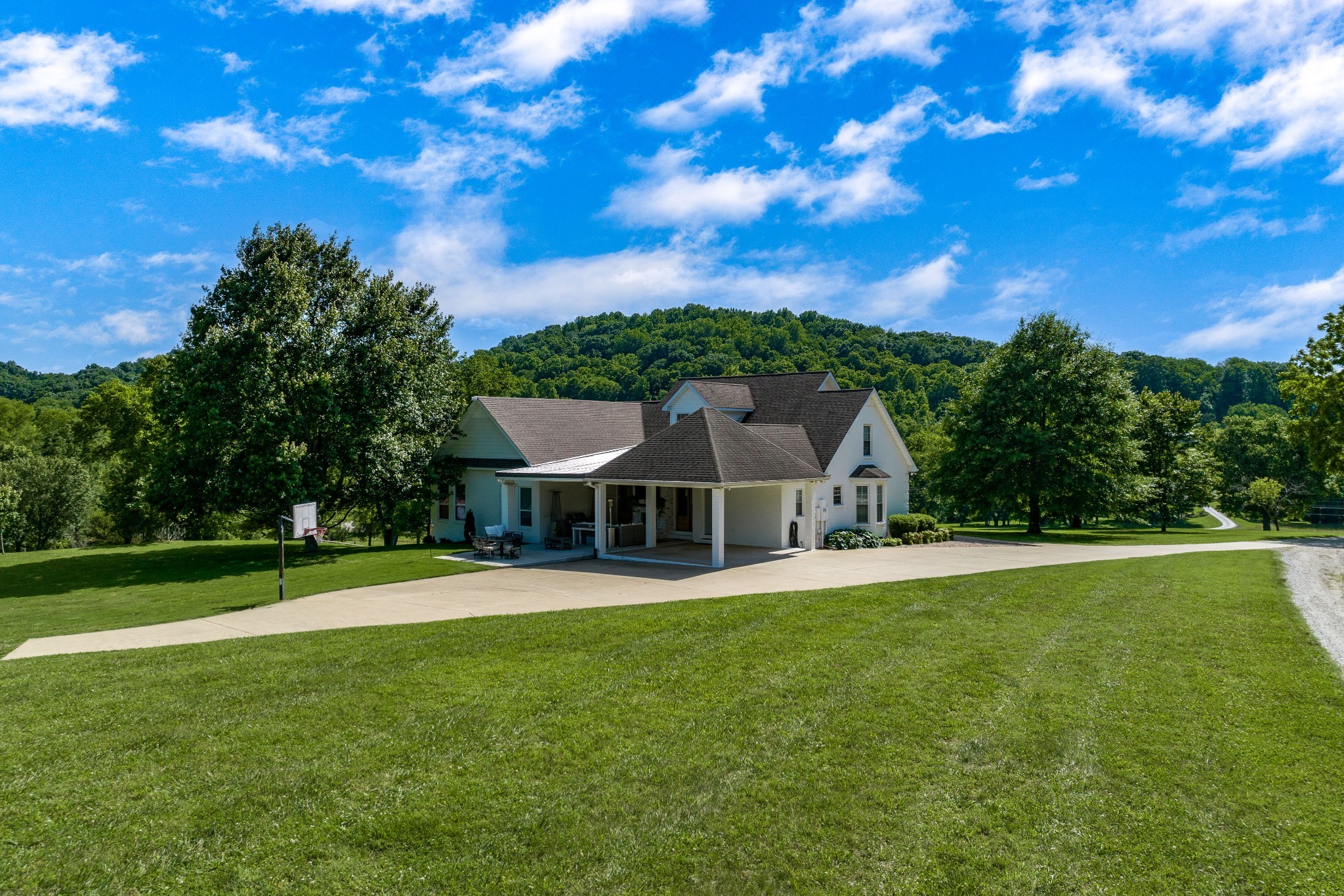4901 Toll Dugger Road Culleoka, TN 38451 - Photo 7 of 68 a front view of a house with a yard