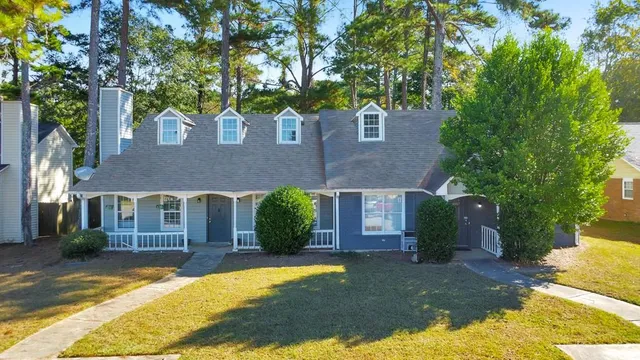 a view of a house with a swimming pool