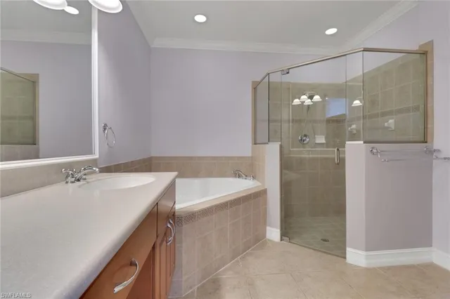 a bathroom with a bathtub sink and mirror