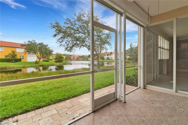 a view of outdoor space with deck and city view