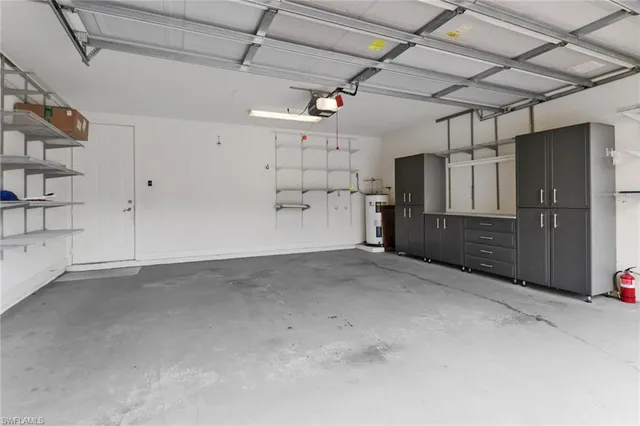 a view of empty room with wooden walls