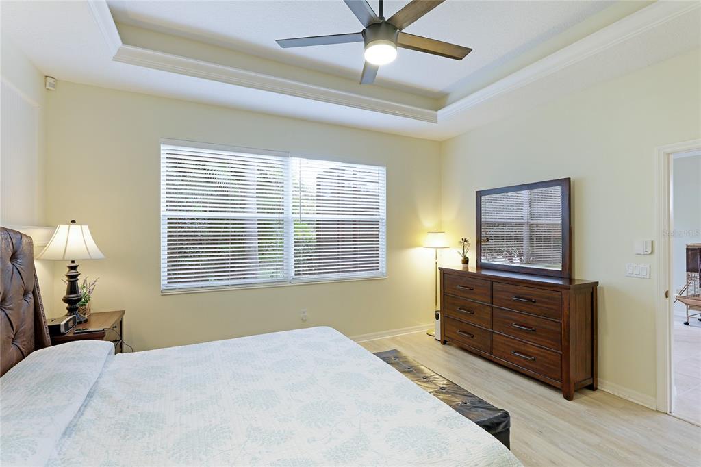 6103 Aviary Court Bradenton, FL 34203 - Photo 20 of 38 a bedroom with a bed and window