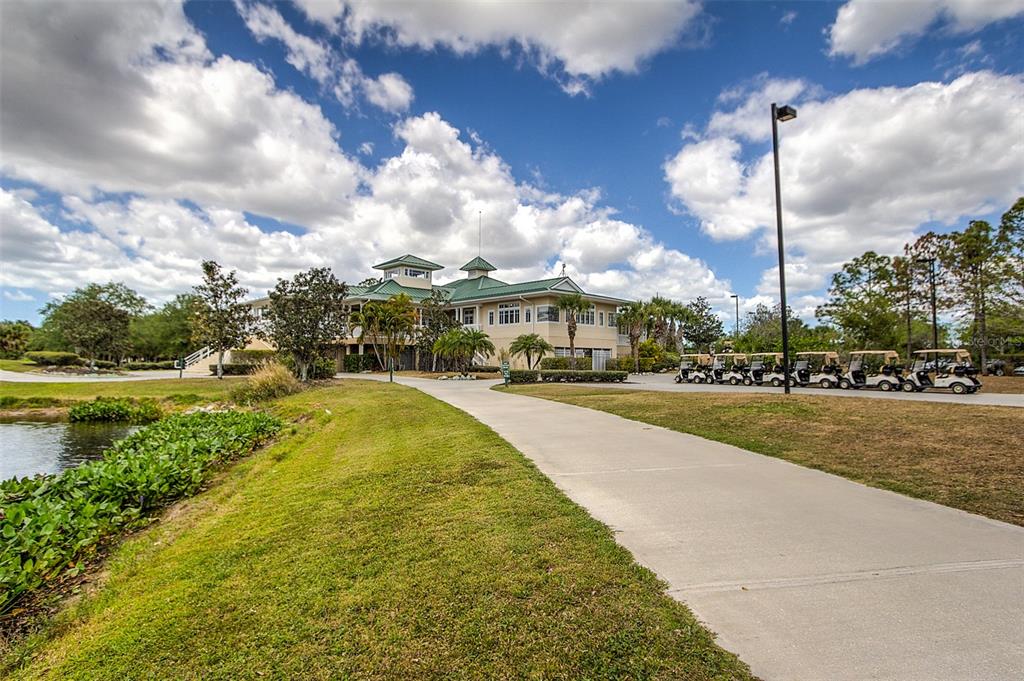 6103 Aviary Court Bradenton, FL 34203 - Photo 30 of 38 a view of a lake with houses