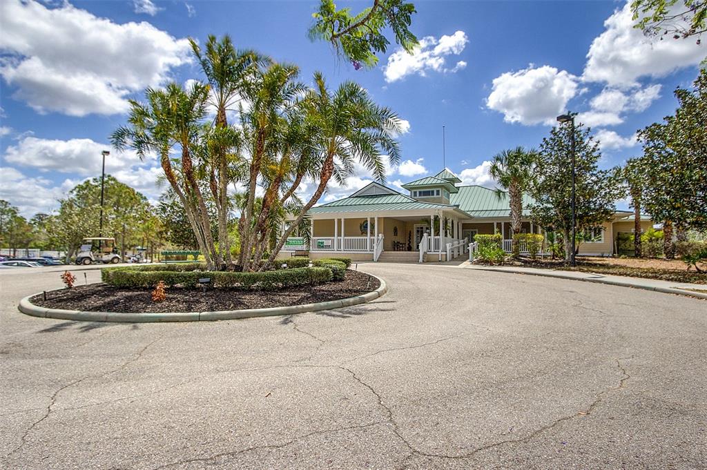 6103 Aviary Court Bradenton, FL 34203 - Photo 31 of 38 a view of a house with a patio