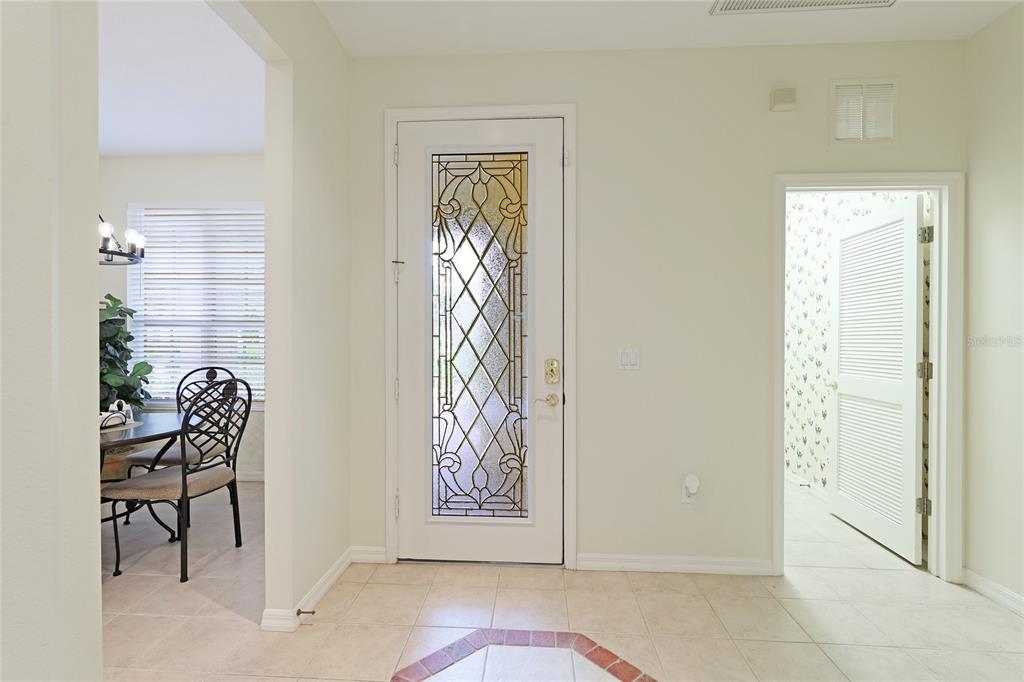 6103 Aviary Court Bradenton, FL 34203 - Photo 5 of 38 a view of front door with wooden floor