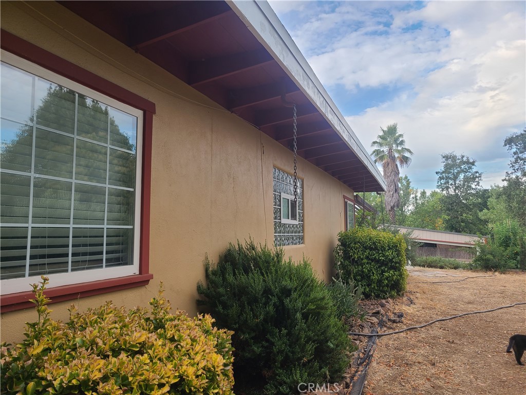 4504 Eickhoff Road Lakeport, CA 95453 - Photo 22 of 40 a house with a yard