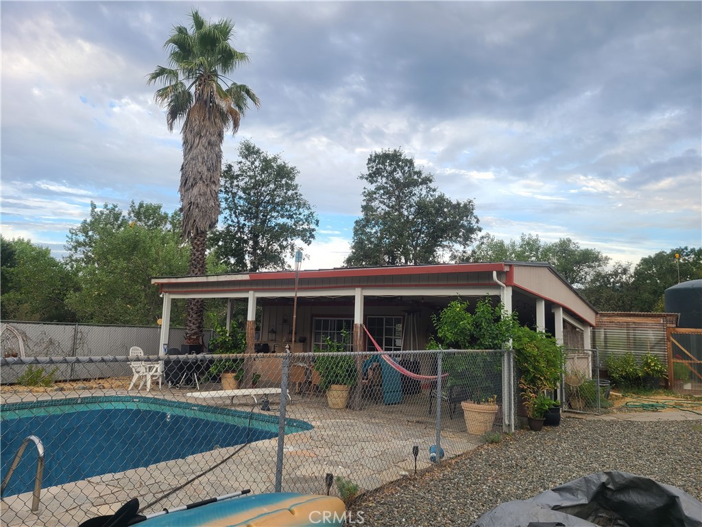 4504 Eickhoff Road Lakeport, CA 95453 - Photo 29 of 40 a view of a house with backyard and sitting area