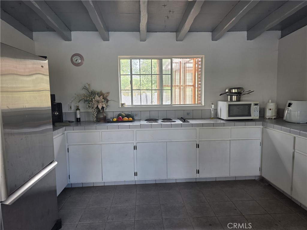 4504 Eickhoff Road Lakeport, CA 95453 - Photo 30 of 40 a room with cabinets and window