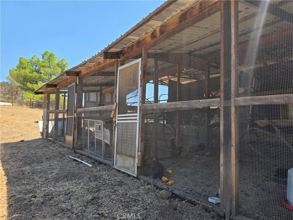 4504 Eickhoff Road Lakeport, CA 95453 - Photo 36 of 40 a view of a house with a backyard