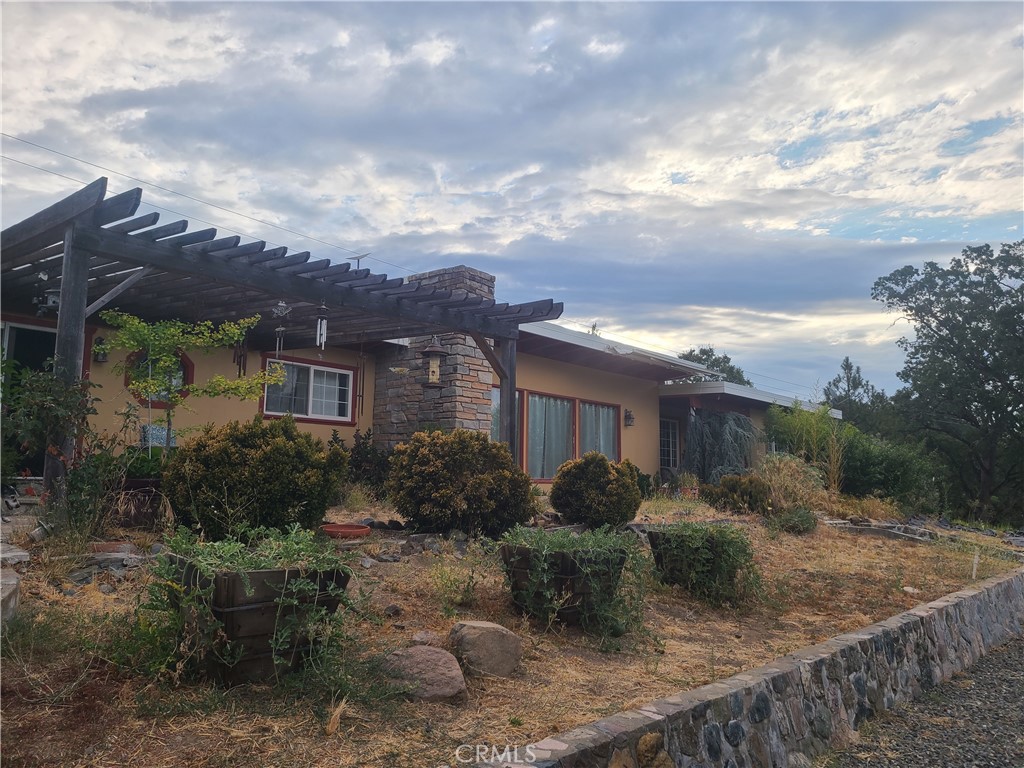 4504 Eickhoff Road Lakeport, CA 95453 - Photo 4 of 40 a view of a house with yard and sitting area
