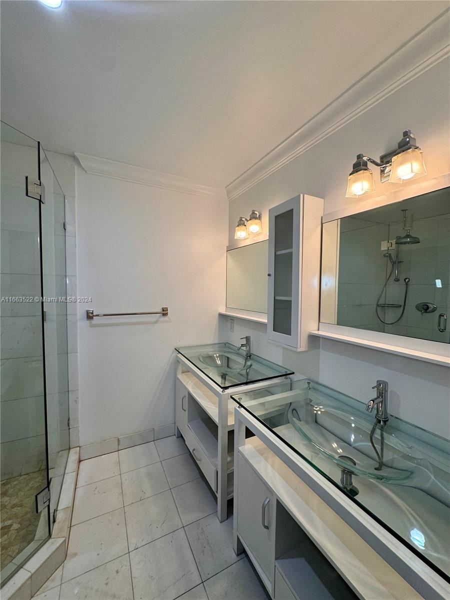 8945 Southwest 125th Terrace, Unit 8945 Miami, FL 33176 - Photo 11 of 29 a kitchen with a stove and a sink