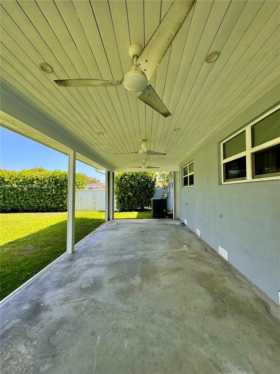 8945 Southwest 125th Terrace, Unit 8945 Miami, FL 33176 - Photo 21 of 29 a view of a backyard of the house