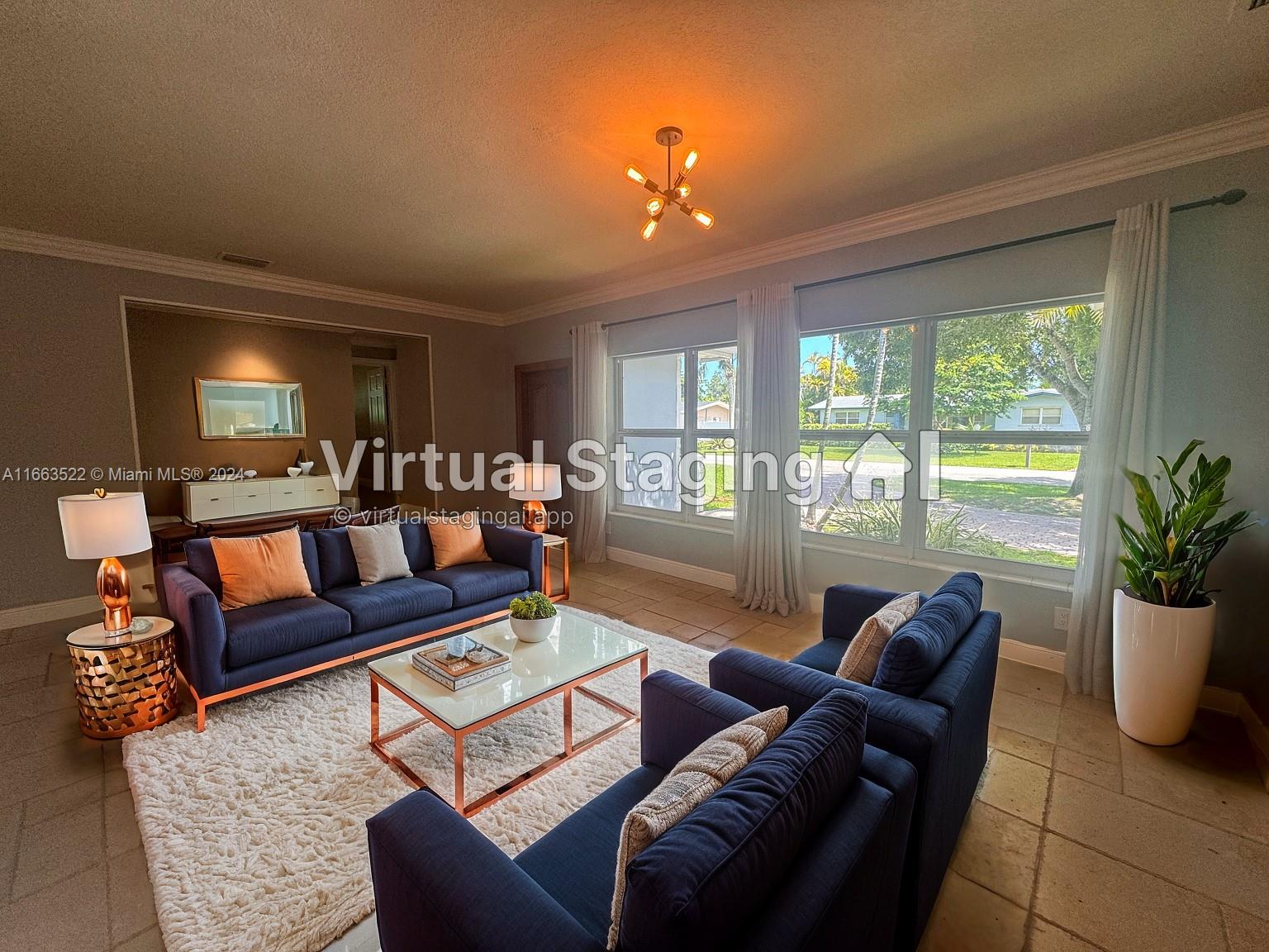 8945 Southwest 125th Terrace, Unit 8945 Miami, FL 33176 - Photo 25 of 29 a living room with furniture and a large window