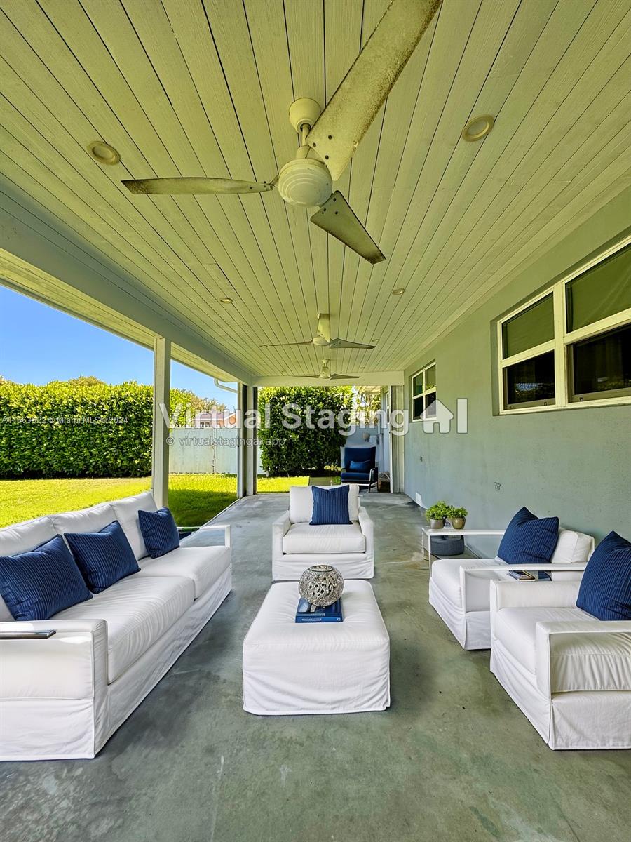 8945 Southwest 125th Terrace, Unit 8945 Miami, FL 33176 - Photo 28 of 29 a view of swimming pool with seating area