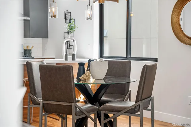 a kitchen with stainless steel appliances granite countertop a refrigerator and a stove