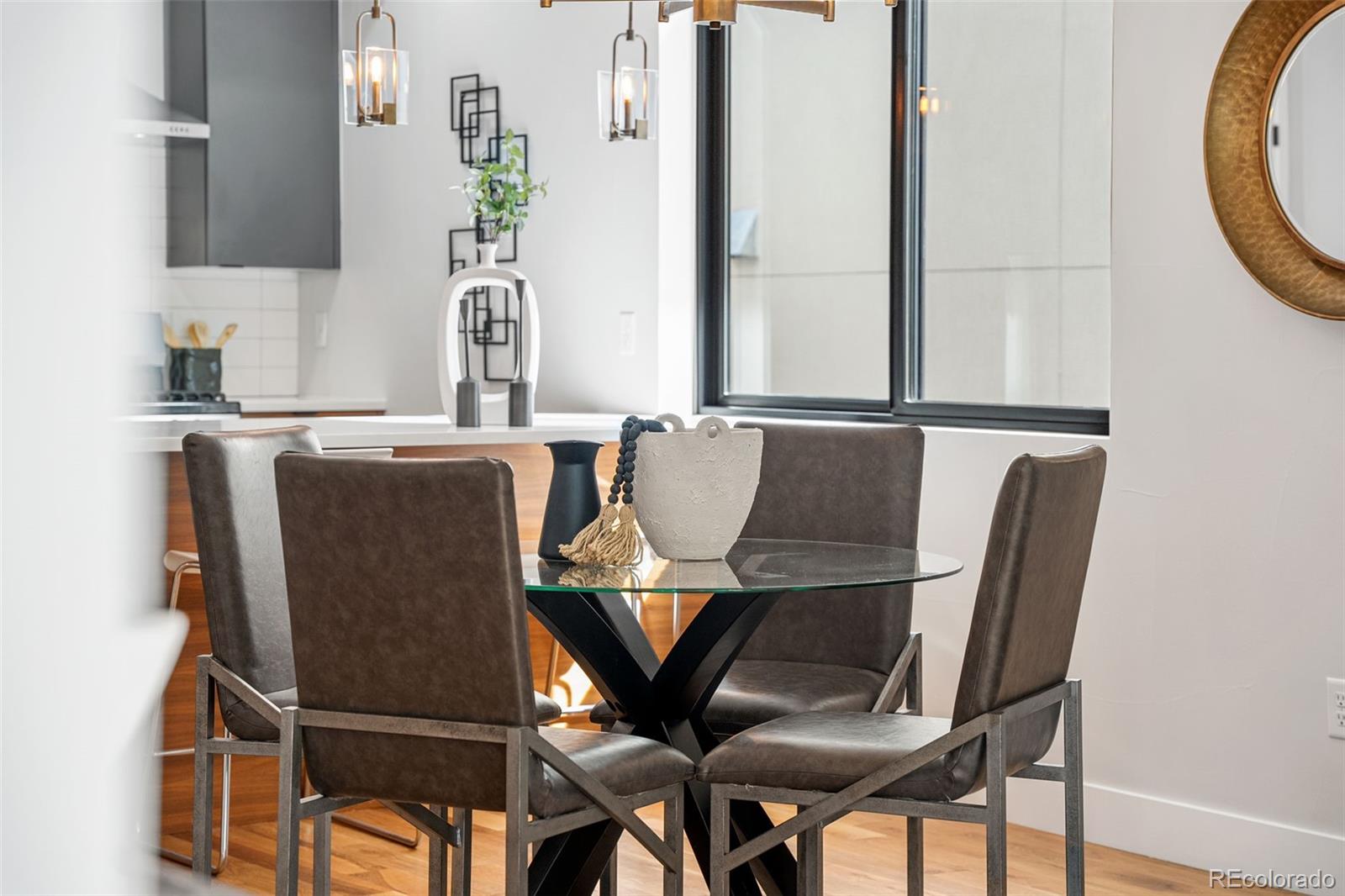 3644 Quivas Street, Unit 2 Denver, CO 80211 - Photo 16 of 49 a dining room with furniture and window