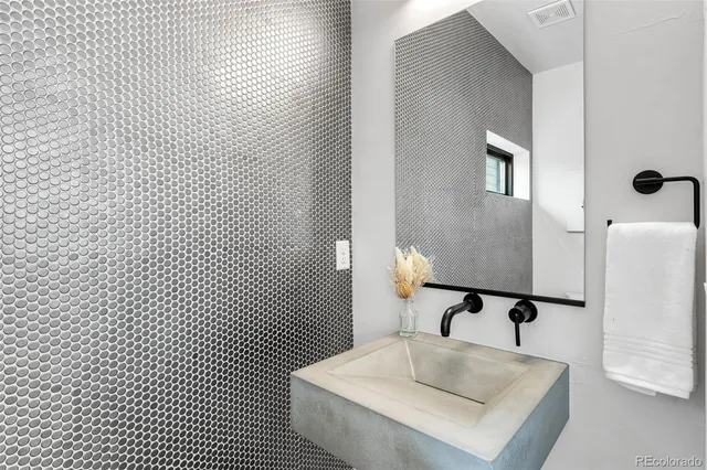 a view of a vase of flowers sitting on a table