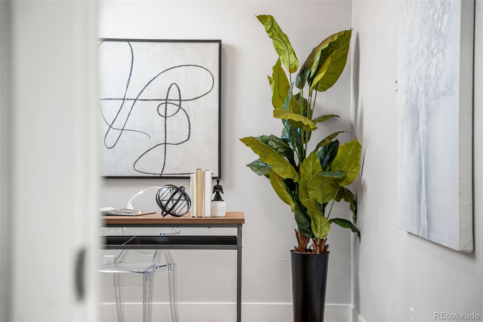 3644 Quivas Street, Unit 2 Denver, CO 80211 - Photo 26 of 49 a view of a vase of flowers sitting on a table