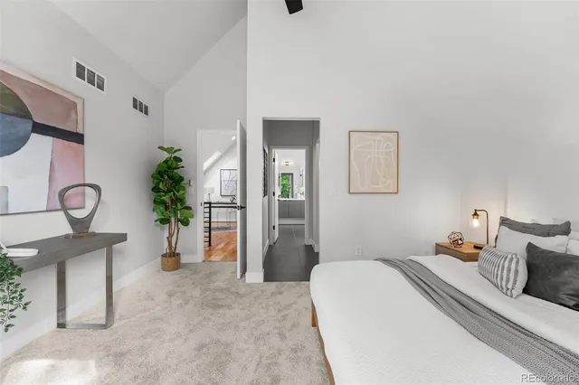 a bathroom with a shower and a sink