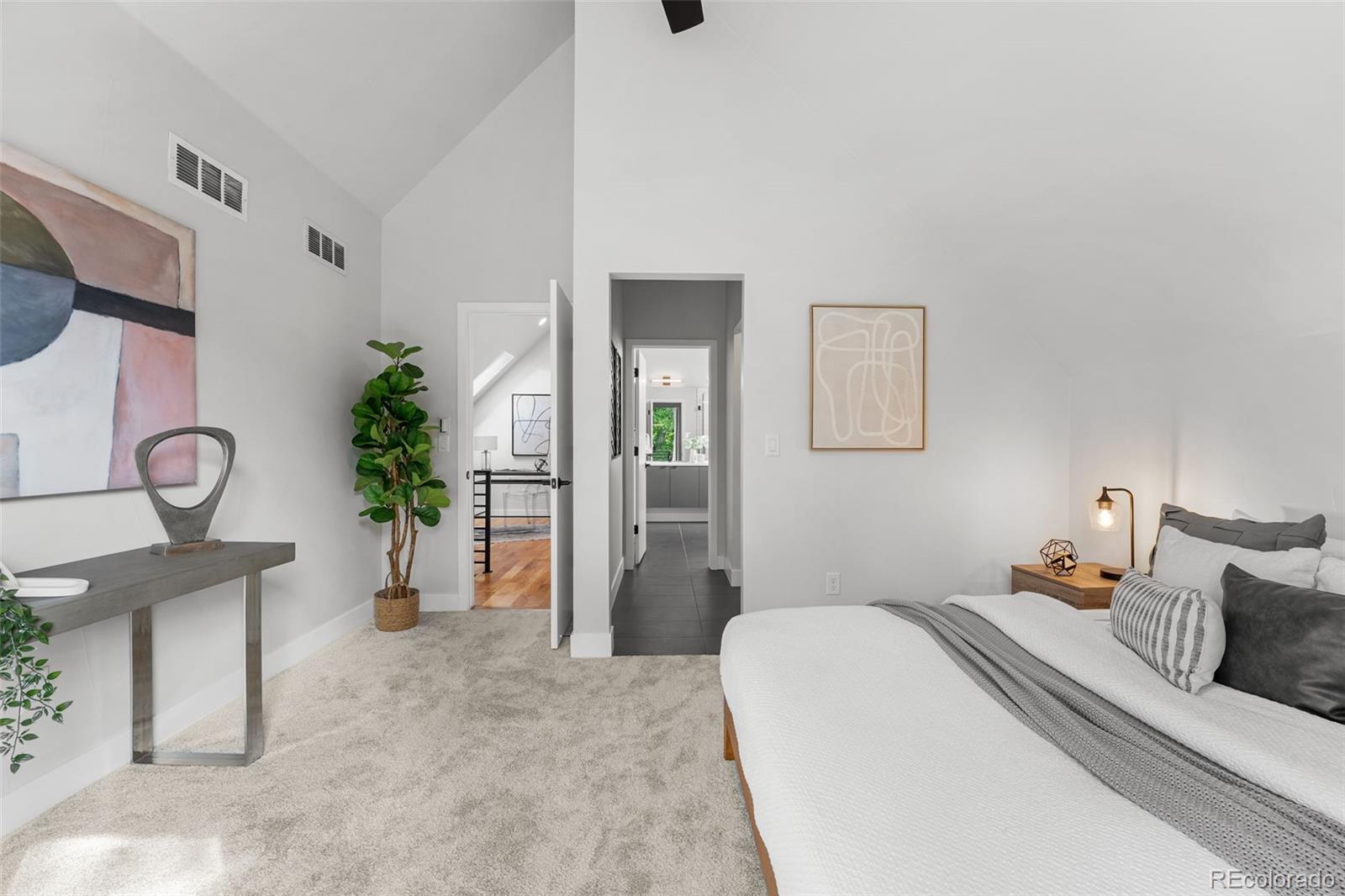 3644 Quivas Street, Unit 2 Denver, CO 80211 - Photo 33 of 49 a bedroom with furniture and a potted plant