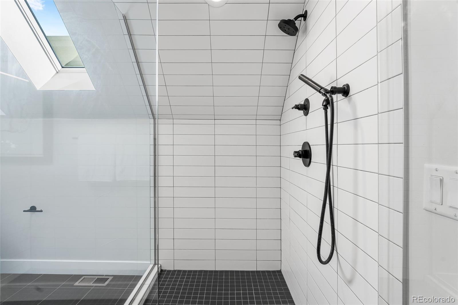 3644 Quivas Street, Unit 2 Denver, CO 80211 - Photo 35 of 49 a bathroom with a shower