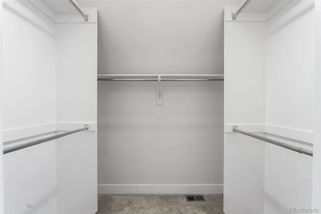 a view of balcony with wooden floor