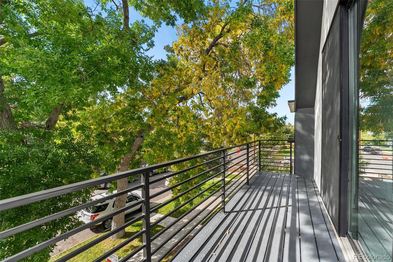 3644 Quivas Street, Unit 2 Denver, CO 80211 - Photo 39 of 49 a view of balcony with wooden floor